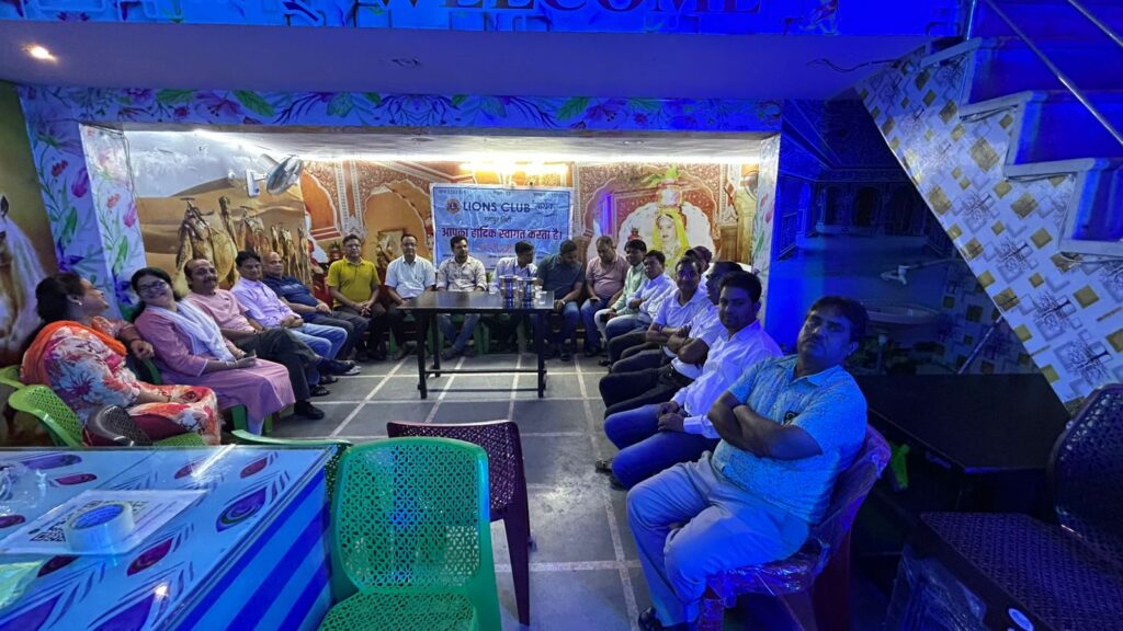 “Group photo of Lions Club Sarthak members during the BOD meeting in Gangapur City, where discussions on Diabetes Camp, CPR Training, Garba Festival, and Oath-taking Ceremony took place.”